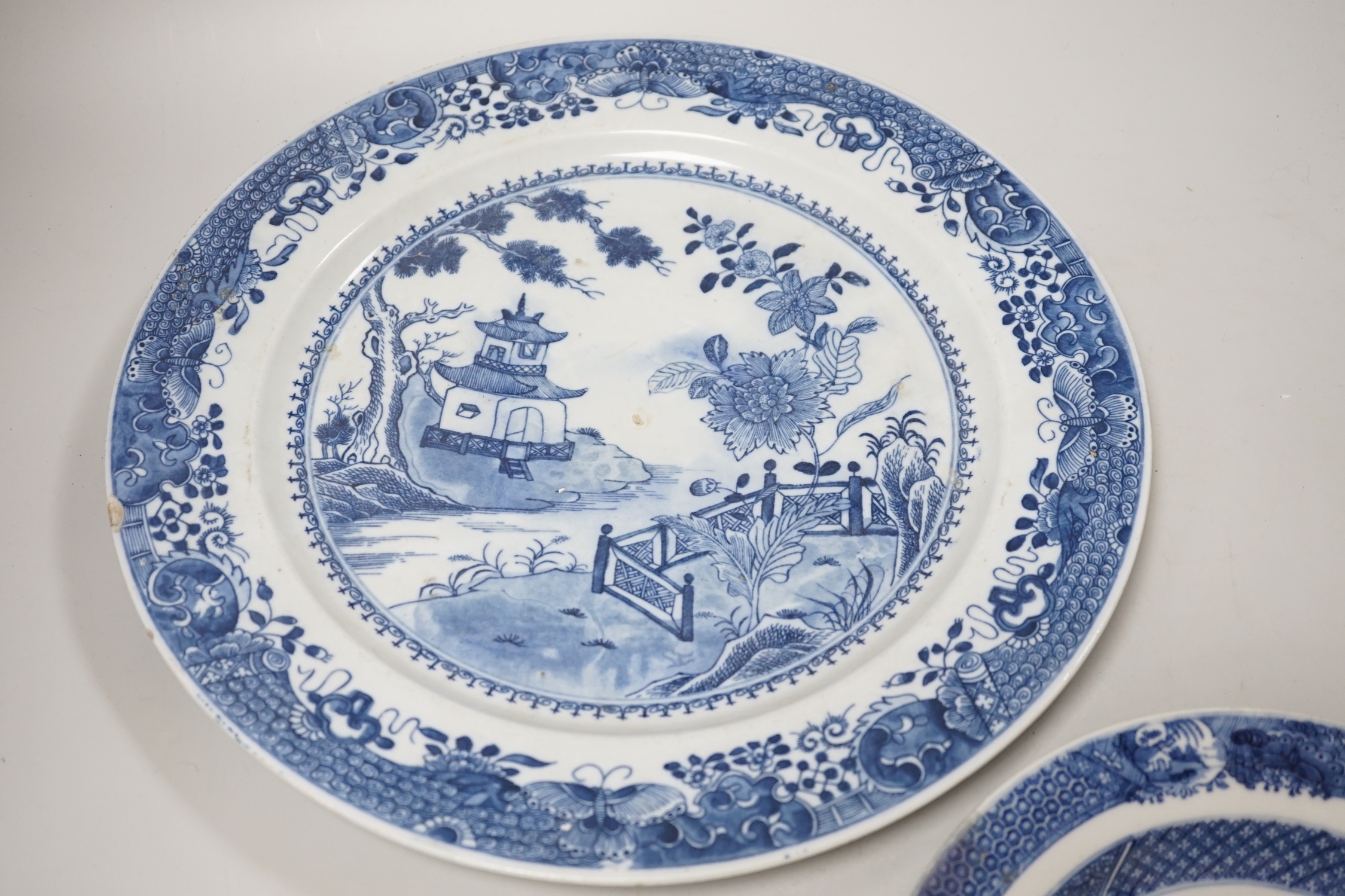 Two Chinese blue and white plates, 18th/19th century, largest 35cm